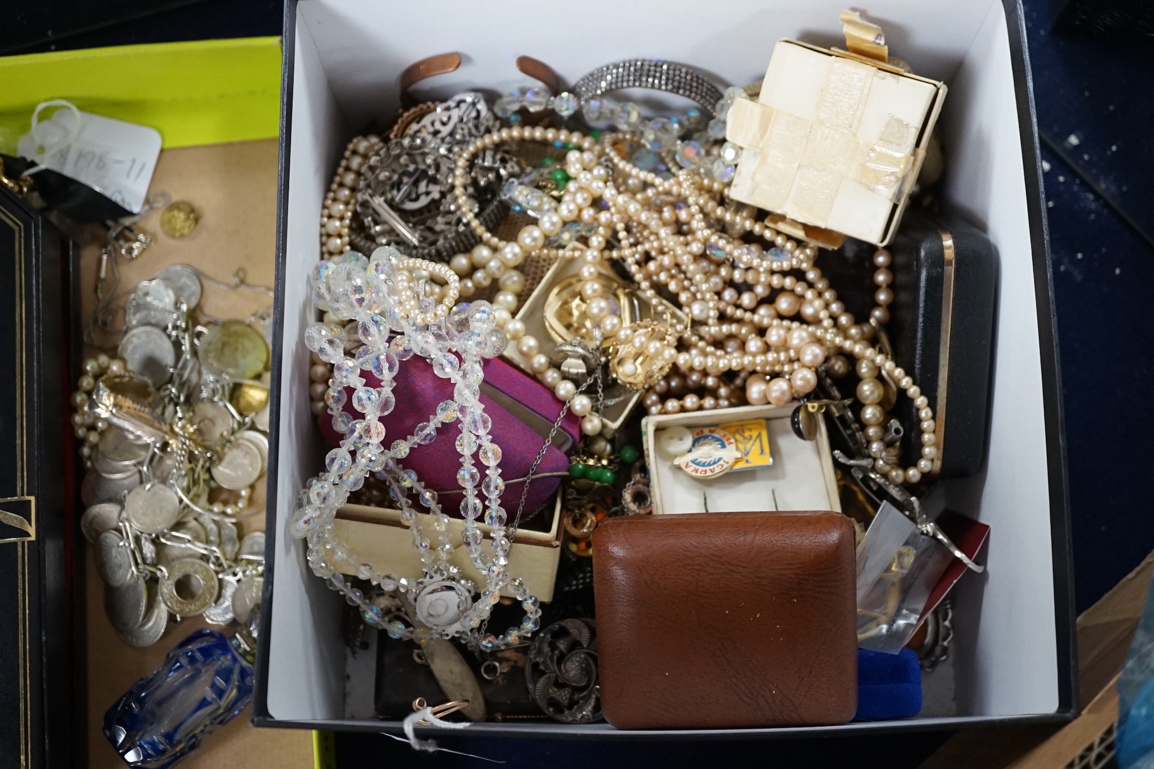 A yellow metal and gem set ring and a large quantity of assorted costume jewellery.